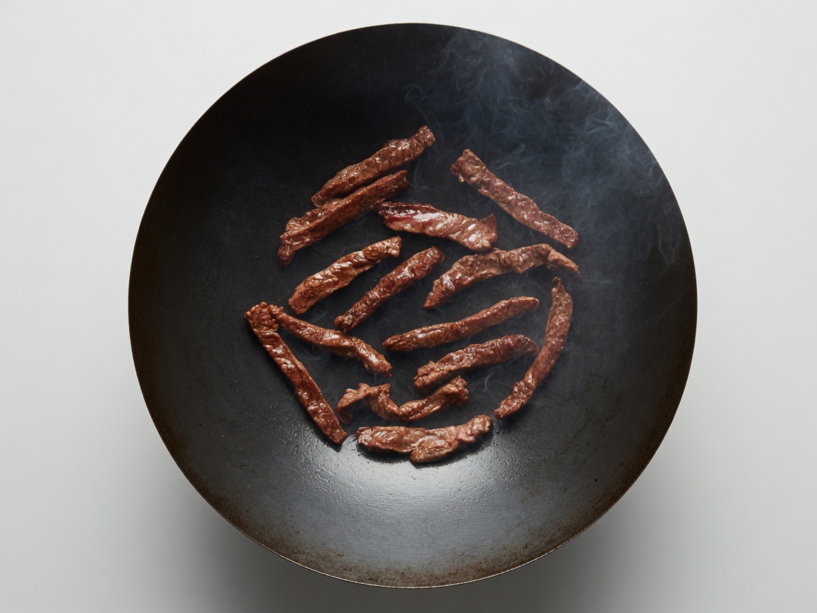 Beef searing in a wok