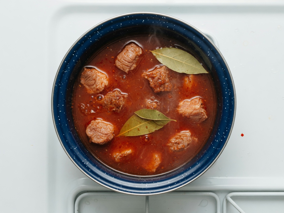 Beef simmering in blended chiles